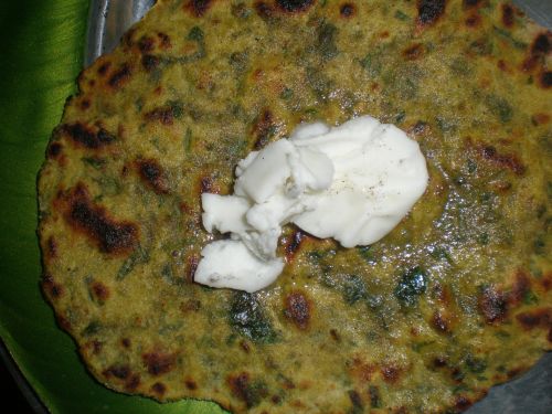 Hot Methi Paratha served with butter