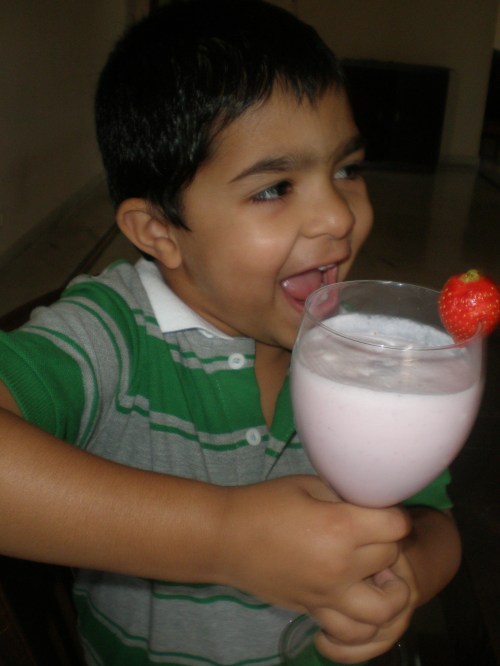 Arnav enjoying his Strawberry Shake